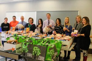 Thanksgiving basket packing at Silvia School with Bristol County Savings Bank volunteers