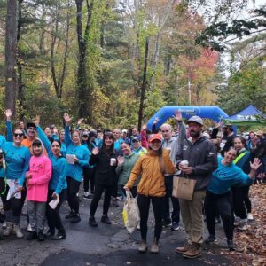 United We Move Trailfest Walk. participants standing at the race entrance
